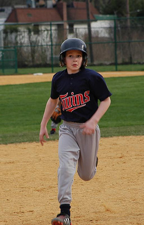 running to third base