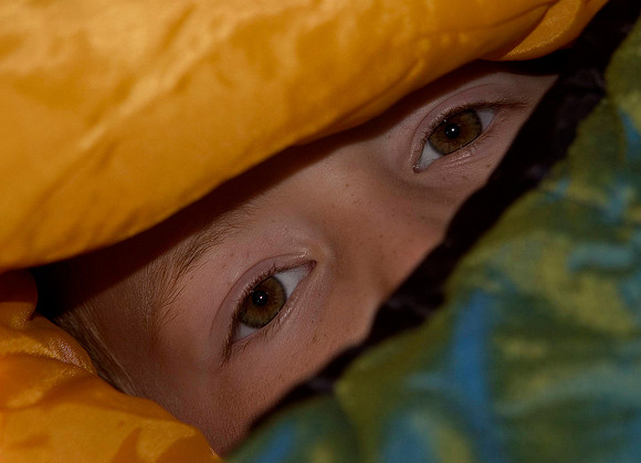 33527658.snuggledinasleepingbag.jpg